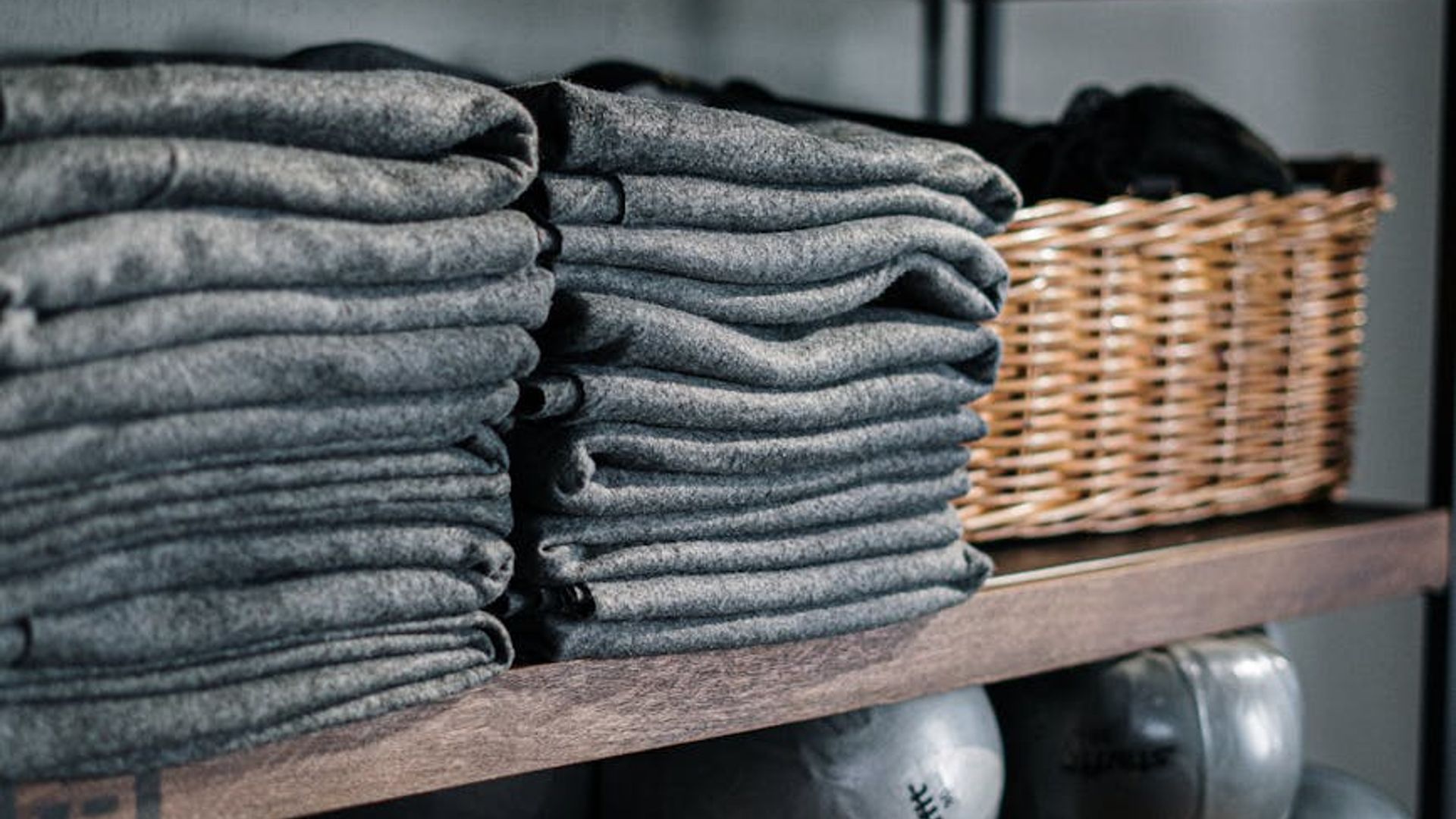 Minimalist fitness studio interior with gym equipment.